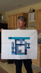 Jen Johnson shows a work of art with all her beautiful modern quilting.