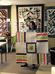 Kathryn Simel's own modern design. Look at the colors and VERY straight line quilting!